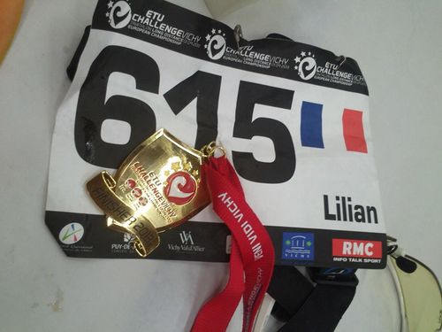 Lilian_maurel_medaille_finisher_triathlon_ironman_vichy_2013